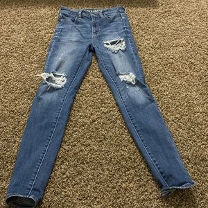 size 0 skinny/stretch ripped jeans